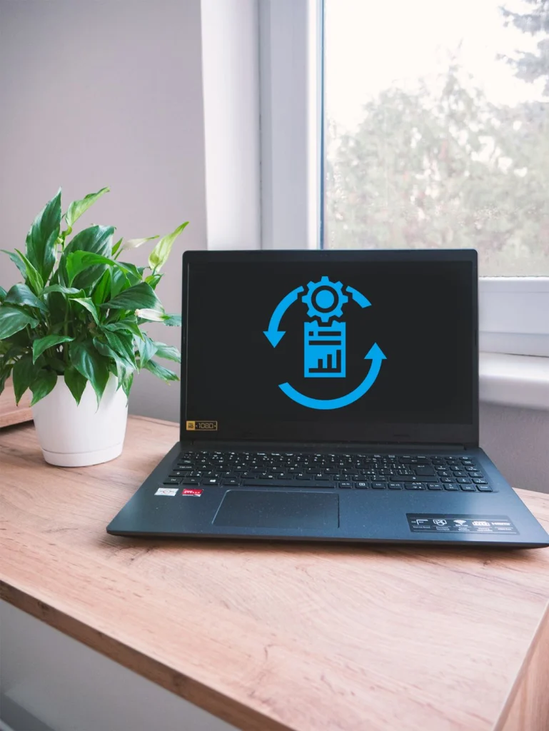 Notebook s ikonou obnovy dat na displeji